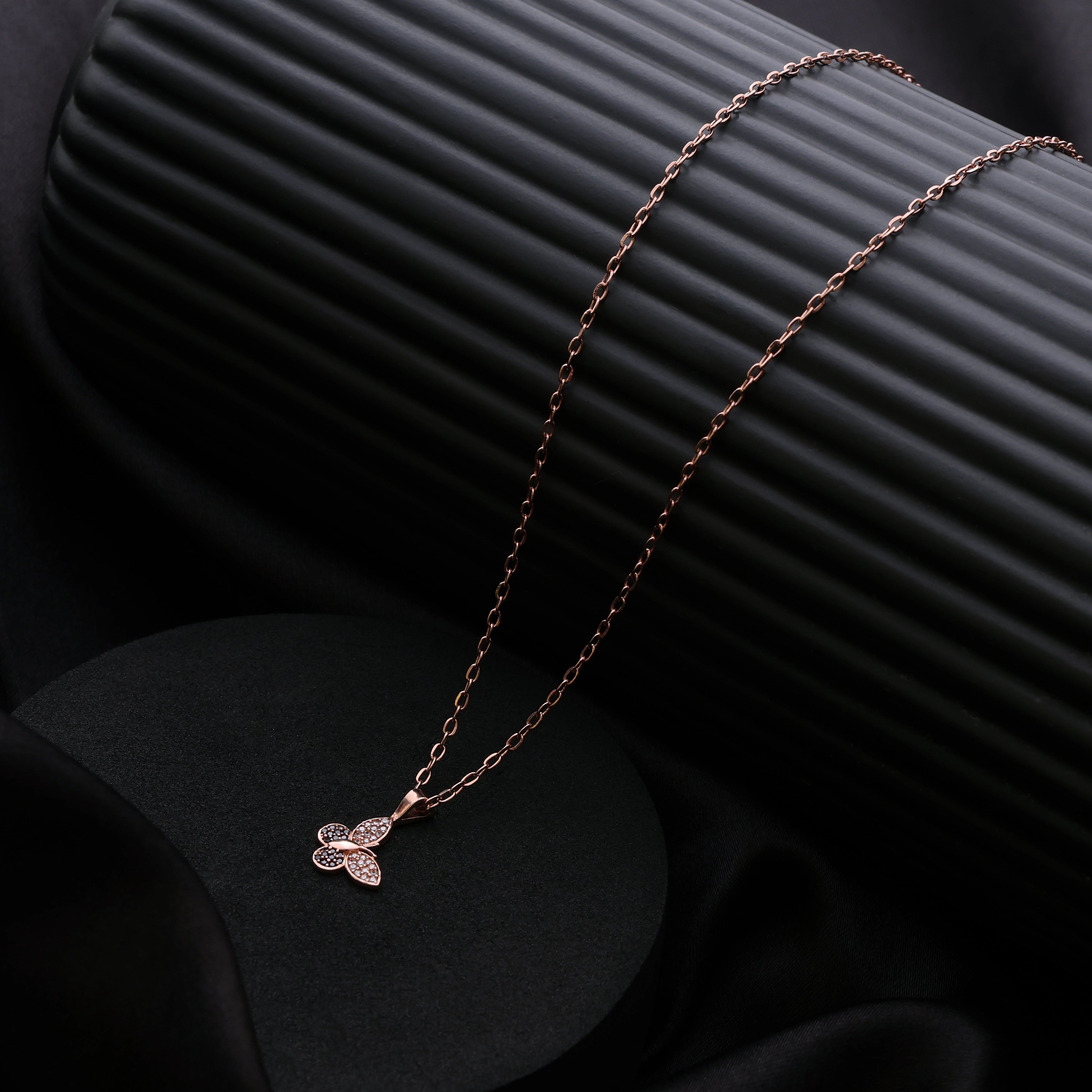 Flutter Glow – Rose Gold Butterfly Pendant