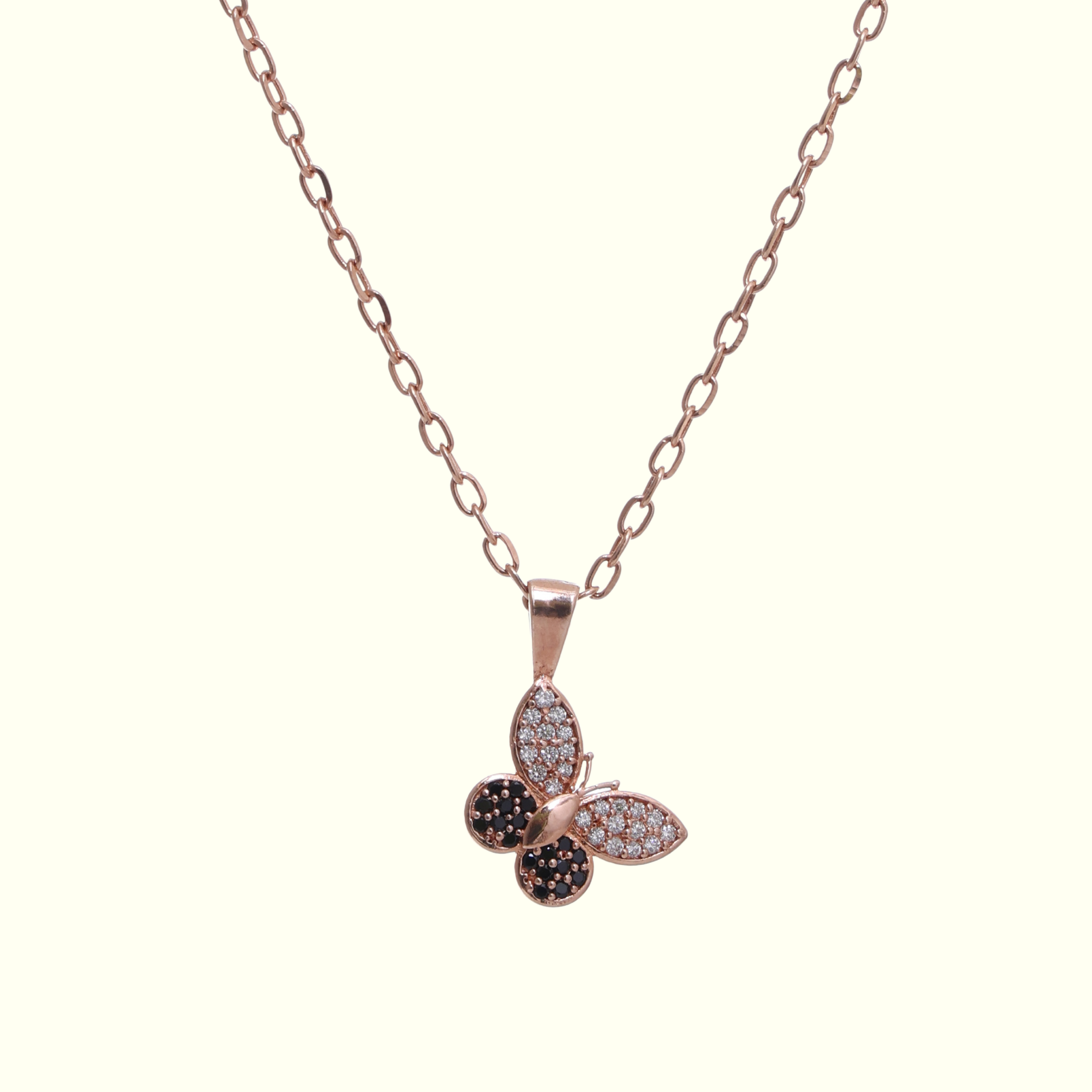 Flutter Glow – Rose Gold Butterfly Pendant